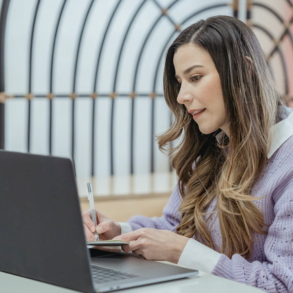 Women working at a laptop